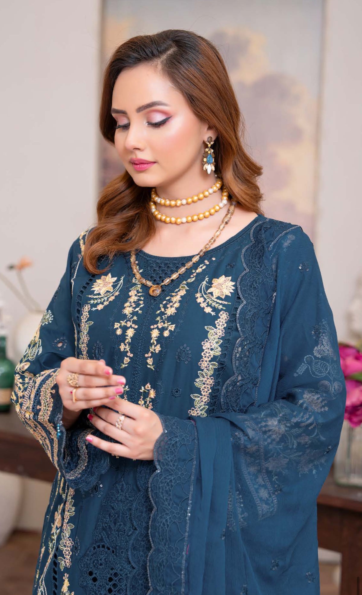 Are1 blue with gold embroidery